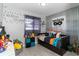 bedroom with a daybed and superhero decor at 14004 Cascade Ln, Tampa, FL 33618