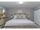 Large bedroom with king-size bed and tasteful wall art at 14004 Cascade Ln, Tampa, FL 33618