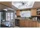 Updated kitchen featuring granite countertops and stainless steel appliances at 14004 Cascade Ln, Tampa, FL 33618