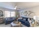 Bright living room with comfy sofas and stylish wall decor at 14004 Cascade Ln, Tampa, FL 33618