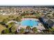 Aerial view of community pool and surrounding homes at 15439 Stone House Dr, Brooksville, FL 34604