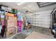 Garage with storage space and room for a vehicle at 15439 Stone House Dr, Brooksville, FL 34604