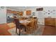 Spacious kitchen with an island and a dining area at 15439 Stone House Dr, Brooksville, FL 34604