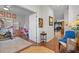 Multipurpose room with built-in shelving, exercise bike, and desk at 15439 Stone House Dr, Brooksville, FL 34604