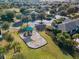 Aerial view of community playground with shaded structure at 15439 Stone House Dr, Brooksville, FL 34604