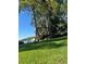 Relaxing backyard with a charming swing at 1624 Sea Breeze Dr, Tarpon Springs, FL 34689