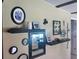 Entryway with decorative shelves and mirror at 1624 Sea Breeze Dr, Tarpon Springs, FL 34689