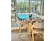 Kitchen nook with small round table and chairs overlooking the pool at 1624 Sea Breeze Dr, Tarpon Springs, FL 34689