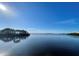 Stunning view of calm water and lush greenery at 1624 Sea Breeze Dr, Tarpon Springs, FL 34689
