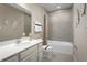Clean bathroom with bathtub, toilet and a vanity at 2467 White Ladyfish Rd, Wimauma, FL 33598