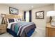 Thematic bedroom with a full-sized bed and soccer decor at 2473 White Ladyfish Rd, Wimauma, FL 33598