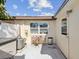 Private patio with storage and a small garden area at 24862 Us Highway 19 N # 1205, Clearwater, FL 33763