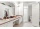 Bathroom with double vanity and walk-in shower at 410 Candlestone Ct, Spring Hill, FL 34609