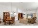 Bright dining room with a wooden table and hutch at 410 Candlestone Ct, Spring Hill, FL 34609