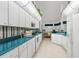 Bright kitchen with teal countertops and white cabinets at 410 Candlestone Ct, Spring Hill, FL 34609