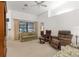 Relaxing living room with comfortable seating and access to a patio at 410 Candlestone Ct, Spring Hill, FL 34609