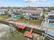 Aerial view of waterfront home with private dock and boat lift at 4225 Carlos Ct, Hernando Beach, FL 34607