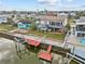 Two-story house with deck, hot tub, and boat dock at 4225 Carlos Ct, Hernando Beach, FL 34607