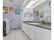 Bathroom features double sinks and stylish wall art at 4225 Carlos Ct, Hernando Beach, FL 34607