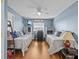 Light and airy bedroom with twin beds and workspace at 4225 Carlos Ct, Hernando Beach, FL 34607