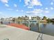 Private boat dock with wooden planks and lift at 4225 Carlos Ct, Hernando Beach, FL 34607