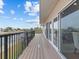 Spacious deck with water views and metal railings at 4225 Carlos Ct, Hernando Beach, FL 34607