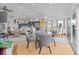 Elegant dining area with glass table and water views at 4225 Carlos Ct, Hernando Beach, FL 34607