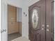 Interior view of entryway with double doors and elevator access at 4225 Carlos Ct, Hernando Beach, FL 34607