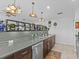Bright kitchen featuring double sinks and a center island at 4225 Carlos Ct, Hernando Beach, FL 34607