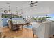 Spacious living room with water views, hardwood floors, and ample seating at 4225 Carlos Ct, Hernando Beach, FL 34607