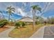Community building with landscaping and parking area at 4710 Parkdale Ln, New Port Richey, FL 34655