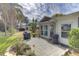 Spacious patio with surrounding landscaping and access to the house at 4710 Parkdale Ln, New Port Richey, FL 34655