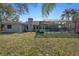 Large backyard featuring a pool and patio area at 5371 Joyner Ave, Spring Hill, FL 34608