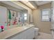 Clean bathroom with a shower/tub combo and updated vanity at 5371 Joyner Ave, Spring Hill, FL 34608