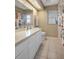 Full bathroom with shower/tub, vanity, and tile floor at 5371 Joyner Ave, Spring Hill, FL 34608