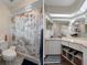 Spacious bathroom with a shower and double vanity at 5371 Joyner Ave, Spring Hill, FL 34608
