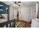 Bedroom with bunk beds and access to living room at 5371 Joyner Ave, Spring Hill, FL 34608