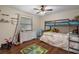 bedroom with bunk beds and playful rug at 5371 Joyner Ave, Spring Hill, FL 34608
