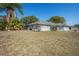 Single-story home with mature landscaping at 5371 Joyner Ave, Spring Hill, FL 34608