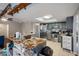 Kitchen with granite countertops, gray cabinets, and a breakfast bar at 5371 Joyner Ave, Spring Hill, FL 34608