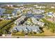Aerial view showcasing community and waterfront location at 5557 Sea Forest Dr # 117, New Port Richey, FL 34652