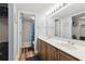 Bathroom with double vanity and a tub shower combo at 5557 Sea Forest Dr # 117, New Port Richey, FL 34652