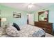 Guest bedroom with double bed and dresser at 5557 Sea Forest Dr # 117, New Port Richey, FL 34652
