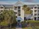 Heather Cove II building, featuring palm trees at 5557 Sea Forest Dr # 117, New Port Richey, FL 34652