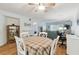 Dining area with a round table and chairs at 5557 Sea Forest Dr # 117, New Port Richey, FL 34652