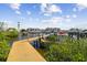 Wooden dock extending into the water at 5557 Sea Forest Dr # 117, New Port Richey, FL 34652