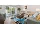 Living room with comfortable seating and balcony access at 5557 Sea Forest Dr # 117, New Port Richey, FL 34652