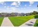Walkway leading to marina with water views at 5557 Sea Forest Dr # 117, New Port Richey, FL 34652