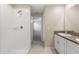 Clean bathroom with shower and double vanity at 578 Argyll Dr, Spring Hill, FL 34609