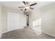 Bright bedroom with double door closet and carpet at 578 Argyll Dr, Spring Hill, FL 34609